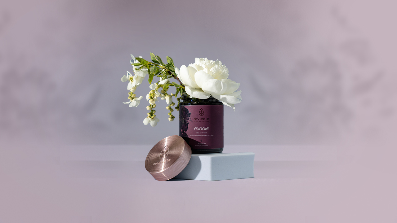 Revivele exhale jar styled with flowers